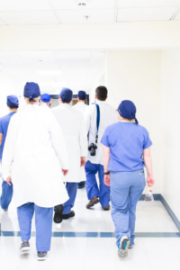 healthcare workers walking in hallway